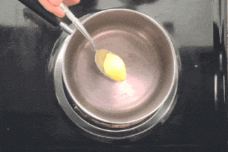 gif of someone making a tadka, that means they're sauteing a spoonful of asafetida hing in ghee