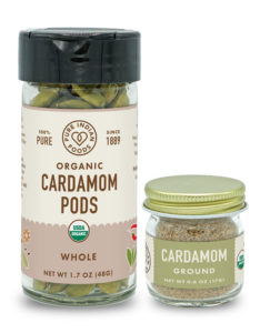 green cardamom in spice bottles