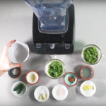 small bowls of mint chutney ingredients in front of a blender